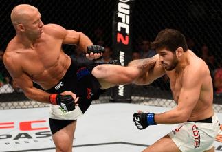 OTTAWA, ON - JUNE 18: (L-R) Donald Cerrone of the United States kicks Patrick Cote of Canada in their welterweight bout during the UFC Fight Night event inside the TD Place Arena on June 18, 2016 in Ottawa, Ontario, Canada. (Photo by Jeff Bottari/Zuffa