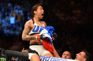 ROTTERDAM, NETHERLANDS - MAY 08: Germaine de Randamie celebrates her victory over Anna Elmose in their women's bantamweight bout during the UFC Fight Night event at Ahoy Rotterdam on May 8, 2016 in Rotterdam, Netherlands. (Photo by Josh Hedges/Zuffa LLC/