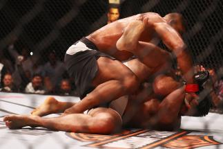 ROTTERDAM, NETHERLANDS - MAY 08: Alistair Overeem of the Netherlands punches on his way to victory over Andrei Arlovski of Belarus in their Heavyweight bout during the UFC Fight Night 87 at Ahoy on May 8, 2016 in Rotterdam, Netherlands. (Photo by Dean M