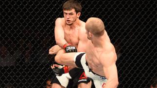 ROTTERDAM, NETHERLANDS - MAY 08: (R-L) Gunnar Nelson kicks Albert Tumenov in their welterweight bout during the UFC Fight Night event at Ahoy Rotterdam on May 8, 2016 in Rotterdam, Netherlands. (Photo by Josh Hedges/Zuffa LLC/Zuffa LLC via Getty Images)