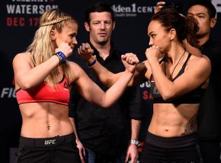 SACRAMENTO, CA - DECEMBER 16: (L-R) Paige VanZant and Michelle Waterson face off during the UFC Fight Night weigh-in inside the Golden 1 Center Arena on December 16, 2016 in Sacramento, California. (Photo by Jeff Bottari/Zuffa LLC/Zuffa LLC via Getty Ima