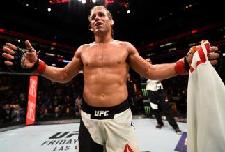 SACRAMENTO, CA - DECEMBER 17: Urijah Faber celebrates after his unanimous-decision victory over Brad Pickett in their bantamweight bout during the UFC Fight Night event inside the Golden 1 Center Arena on December 17, 2016 in Sacramento, California. (Pho