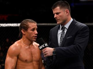 SACRAMENTO, CA - DECEMBER 17: Urijah Faber is interviewed by Brian Stann after his unanimous-decision victory over Brad Pickett in their bantamweight bout during the UFC Fight Night event inside the Golden 1 Center Arena on December 17, 2016 in Sacrament