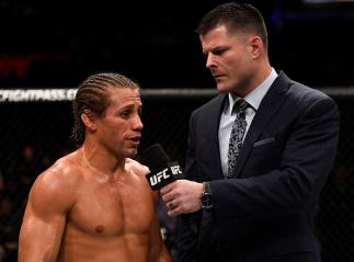 SACRAMENTO, CA - DECEMBER 17:  Urijah Faber is interviewed by Brian Stann after his unanimous-decision victory over Brad Pickett in their bantamweight bout during the UFC Fight Night event inside the Golden 1 Center Arena on December 17, 2016 in Sacrament