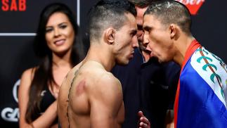 SAO PAULO, BRAZIL - NOVEMBER 18: Opponents Thomas Almeida (L) of Brazil and Albert Morales of the United States face off during the UFC Fight Night weigh-in at Ibirapuera gymnasium on November 18, 2016 in Sao Paulo, Brazil. (Photo by Buda Mendes/Zuffa LLC