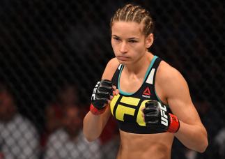 SASKATOON, SK - AUGUST 23: Maryna Moroz of Ukraine stands in the Octagon between rounds of her women's strawweight bout against Valerie Letourneau during the UFC event at the SaskTel Centre on August 23, 2015 in Saskatoon, Saskatchewan, Canada. (Photo by