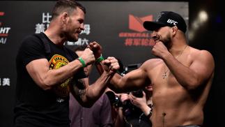 SHANGHAI, CHINA - NOVEMBER 24: (L-R) Michael Bisping of England and Kelvin Gastelum face off during the UFC Fight Night weigh-in on November 24, 2017 in Shanghai, China. (Photo by Brandon Magnus/Zuffa LLC via Getty Images)