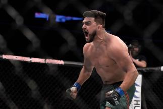 SHANGHAI, CHINA - NOVEMBER 25: Kelvin Gastelum celebrates during the UFC Fight Night at Mercedes-Benz Arena on November 25, 2017 in Shanghai, China. (Photo by Hu Chengwei/Getty Images)