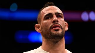 TAMPA, FL - APRIL 16: Santiago Ponzinibbio celebrates his victory over Court McGee in their welterweight bout during the UFC Fight Night event at Amalie Arena on April 16, 2016 in Tampa, Florida. (Photo by Jeff Bottari/Zuffa LLC/Zuffa LLC via Getty Imag