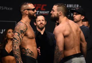 WINNIPEG, CANADA - DECEMBER 15: (L-R) Santiago Ponzinibbio of Argentina and Mike Perry face off during the UFC Fight Night weigh-in on December 15, 2017 in Winnipeg, Canada. (Photo by Josh Hedges/Zuffa LLC/Zuffa LLC via Getty Images)
