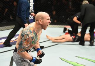 WINNIPEG, CANADA - DECEMBER 16:  Josh Emmett celebrates his knockout victory over Ricardo Lamas in their featherweight bout during the UFC Fight Night event at Bell MTS Place on December 16, 2017 in Winnipeg, Manitoba, Canada. (Photo by Josh Hedges/Zuffa 