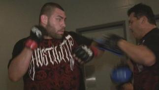 Velasquez hitting mitts