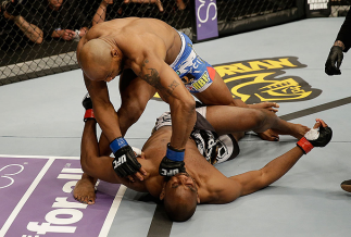 SAN JOSE, CA - APRIL 20: Yoel Romero (top) punches Clifford Starks in their middleweight bout during the UFC on FOX event at the HP Pavilion on April 20, 2013 in San Jose, California. (Photo by Ezra Shaw/Zuffa LLC/Zuffa LLC via Getty Images) *** Local