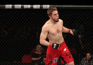 SYDNEY, AUSTRALIA - MARCH 03:  TJ Waldburger reacts after defeating Jake Hecht by submission during the UFC on FX event at Allphones Arena on March 3, 2012 in Sydney, Australia.  (Photo by Josh Hedges/Zuffa LLC/Zuffa LLC via Getty Images) *** Local Captio