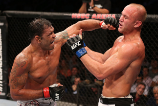 RIO DE JANEIRO, BRAZIL - OCTOBER 13: (L-R) Antonio Rodrigo "Minotauro" Nogeuira puncehs Dave Herman during their heavyweight fight at UFC 153 inside HSBC Arena on October 13, 2012 in Rio de Janeiro, Brazil. (Photo by Josh Hedges/Zuffa LLC/Zuffa LLC via