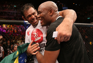 RIO DE JANEIRO, BRAZIL - OCTOBER 13: (R-L) Anderson Silva and his teammate Antonio Rodrigo "Minotauro" Nogeuira celebrate after Silva's victory over Stephan Bonnar during their light heavyweight fight at UFC 153 inside HSBC Arena on October 13, 2012 in R