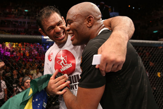 RIO DE JANEIRO, BRAZIL - OCTOBER 13:  (R-L) Anderson Silva and his teammate Antonio Rodrigo "Minotauro" Nogeuira celebrate after Silva's victory over Stephan Bonnar during their light heavyweight fight at UFC 153 inside HSBC Arena on October 13, 2012 in R