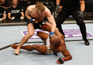 STOCKHOLM, SWEDEN - APRIL 06: (L-R) Conor McGregor punches Marcus Brimage in their featherweight fight at the Ericsson Globe Arena on April 6, 2013 in Stockholm, Sweden. (Photo by Josh Hedges/Zuffa LLC/Zuffa LLC via Getty Images)