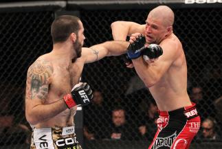 LAS VEGAS, NV - FEBRUARY 04: Matt Brown (left) punches Chris Cope during the UFC 143 event at Mandalay Bay Events Center on February 4, 2012 in Las Vegas, Nevada. (Photo by Nick Laham/Zuffa LLC/Zuffa LLC via Getty Images) *** Local Caption *** Matt Brow