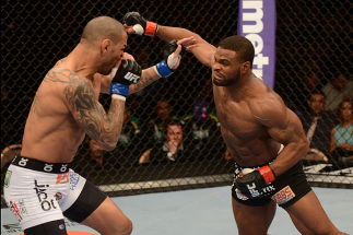 LAS VEGAS, NV - FEBRUARY 02: (R-L) Tyron Woodley punches Jay Hieron during their welterweight fight at UFC 156 on February 2, 2013 at the Mandalay Bay Events Center in Las Vegas, Nevada. (Photo by Donald Miralle/Zuffa LLC/Zuffa LLC via Getty Images) ***