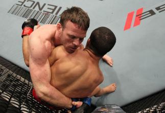TORONTO, ON - DECEMBER 10: (L-R) Dennis Hallman attempts to take down John Makdessi during the UFC 140 event at Air Canada Centre on December 10, 2011 in Toronto, Ontario, Canada. (Photo by Nick Laham/Zuffa LLC/Zuffa LLC via Getty Images)