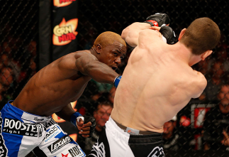 SEATTLE, WA - JULY 27: (L-R) Melvin Guillard punches Mac Danzig in their lightweight bout during the UFC on FOX event at Key Arena on July 27, 2013 in Seattle, Washington. (Photo by Josh Hedges/Zuffa LLC/Zuffa LLC via Getty Images) *** Local Caption *** M