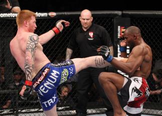 LAS VEGAS, NV - FEBRUARY 04: Ed Herman (left) kicks Clifford Starks during the UFC 143 event at Mandalay Bay Events Center on February 4, 2012 in Las Vegas, Nevada. (Photo by Nick Laham/Zuffa LLC/Zuffa LLC via Getty Images) *** Local Caption *** Ed Herm