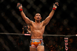 LAS VEGAS, NV - JULY 06: Mark Munoz reacts to his victory over Tim Boetsch in their middleweight fight during the UFC 162 event inside the MGM Grand Garden Arena on July 6, 2013 in Las Vegas, Nevada. (Photo by Josh Hedges/Zuffa LLC/Zuffa LLC via Getty I