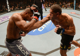LAS VEGAS, NV - FEBRUARY 02: (R-L) Antonio Silva punches Alistair Overeem during their heavyweight fight at UFC 156 on February 2, 2013 at the Mandalay Bay Events Center in Las Vegas, Nevada. (Photo by Donald Miralle/Zuffa LLC/Zuffa LLC via Getty Images