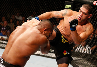 LAS VEGAS, NV - FEBRUARY 02: (R-L) Antonio Silva kicks Alistair Overeem during their heavyweight fight at UFC 156 on February 2, 2013 at the Mandalay Bay Events Center in Las Vegas, Nevada. (Photo by Josh Hedges/Zuffa LLC/Zuffa LLC via Getty Images) ***
