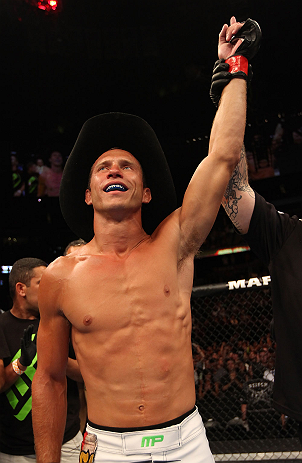 DENVER, CO - AUGUST 11: Donald "Cowboy" Cerrone reacts after knocking out Melvin Guillard during their lightweight bout at UFC 150 inside Pepsi Center on August 11, 2012 in Denver, Colorado. (Photo by Nick Laham/Zuffa LLC/Zuffa LLC via Getty Images)