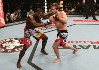 NOTTINGHAM, ENGLAND - SEPTEMBER 29: (R-L) Brad Pickett knocks out Yves Jabouin with an uppercut during their bantamweight fight at the UFC on Fuel TV event at Capital FM Arena on September 29, 2012 in Nottingham, England. (Photo by Josh Hedges/Zuffa LLC