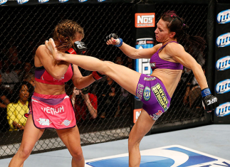 LAS VEGAS, NV - APRIL 13: (R-L) Cat Zingano kicks Miesha Tate in their bantamweight fight at the Mandalay Bay Events Center on April 13, 2013 in Las Vegas, Nevada. (Photo by Josh Hedges/Zuffa LLC/Zuffa LLC via Getty Images) *** Local Caption *** Mies