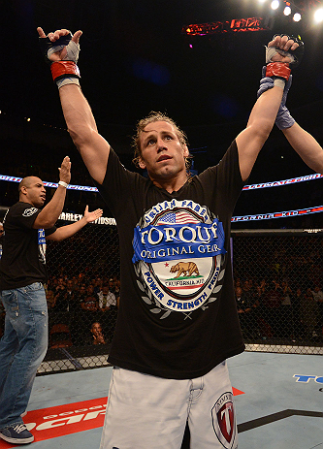 ANAHEIM, CA - FEBRUARY 23: Urijah Faber is declared the winner over Ivan Menjivar in their bantamweight bout during UFC 157 at Honda Center on February 23, 2013 in Anaheim, California. (Photo by Donald Miralle/Zuffa LLC/Zuffa LLC via Getty Images) *** L