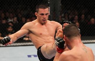 OMAHA, NE - FEBRUARY 15: (L-R) Jake Ellenberger kicks Diego Sanchez during the UFC on FUEL TV event at Omaha Civic Auditorium on February 15, 2012 in Omaha, Nebraska. (Photo by Josh Hedges/Zuffa LLC/Zuffa LLC via Getty Images) *** Local Caption *** Jake
