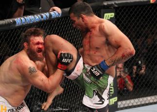 LAS VEGAS, NV - FEBRUARY 04: Fabricio Werdum (right) knees Roy Nelson during the UFC 143 event at Mandalay Bay Events Center on February 4, 2012 in Las Vegas, Nevada. (Photo by Nick Laham/Zuffa LLC/Zuffa LLC via Getty Images) *** Local Caption *** Fabri