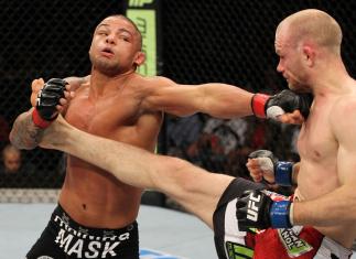 SYDNEY, AUSTRALIA - MARCH 03: (R-L) Martin Kampmann and Thiago Alves trade strikes in a welterweight bout during the UFC on FX event at Allphones Arena on March 3, 2012 in Sydney, Australia. (Photo by Josh Hedges/Zuffa LLC/Zuffa LLC via Getty Images) **