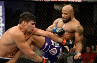 FORT CAMPBELL, KENTUCKY - NOVEMBER 6: (R-L) Yoel Romero knees Ronny Markes in their UFC middleweight bout on November 6, 2013 in Fort Campbell, Kentucky. (Photo by Jeff Bottari/Zuffa LLC/Zuffa LLC via Getty Images) *** Local Caption ***Ronny Markes; Yoel