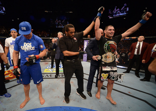 LAS VEGAS, NV - DECEMBER 29: Cain Velasquez (right) is named the winner over Junior dos Santos (left) after their heavyweight championship fight at UFC 155 on December 29, 2012 at MGM Grand Garden Arena in Las Vegas, Nevada. (Photo by Donald Miralle/Zuff