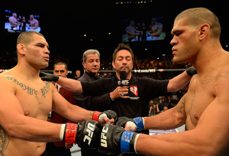 LAS VEGAS, NV - MAY 25:   (L-R) Cain Velasquez and Antonio Silva touch gloves before their heavyweight championship bout during UFC 160 at the MGM Grand Garden Arena on May 25, 2013 in Las Vegas, Nevada.  (Photo by Donald Miralle/Zuffa LLC/Zuffa LLC via G