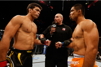 MANCHESTER, ENGLAND - OCTOBER 26: (L-R) Opponents Lyoto Machida and Mark Munoz face off before their middleweight bout during the UFC Fight Night event at Phones 4 U Arena on October 26, 2013 in Manchester, England. (Photo by Josh Hedges/Zuffa LLC/Zuffa