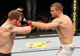 Pascal Krauss of Germany fights Marc Scanlon (L) of the United Kingdom during their UFC Welterweight bout at the Konig Pilsner Arena on November 13, 2010 in Oberhausen, Germany. (Photo by Josh Hedges/Zuffa LLC/Zuffa LLC)