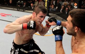 Amir Sadollah (L) of the USA fights Peter Sobatta of Germany during their UFC Welterweight bout at the Konig Pilsner Arena on November 13, 2010 in Oberhausen, Germany. (Photo by Josh Hedges/Zuffa LLC/Zuffa LLC)