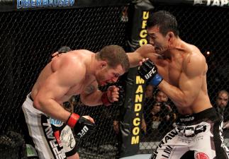 Nate Marquardt of the USA fights Yushin Okami (R) of Japan during their UFC Middleweight Championship Eliminator bout at the Konig Pilsner Arena on November 13, 2010 in Oberhausen, Germany. (Photo by Josh Hedges/Zuffa LLC/Zuffa LLC)