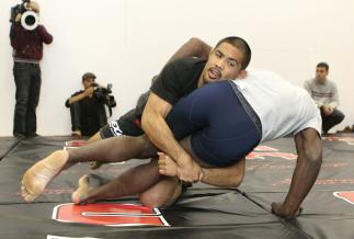 Mark Munoz (L) and Phil Davis (R) work out for the media at the UFC 123 open workouts at the Detroit Athletic Club in Detroit, Michigan on November 18, 2010 (Photo by Josh Hedges/Zuffa LLC/Zuffa LLC via Getty Images)