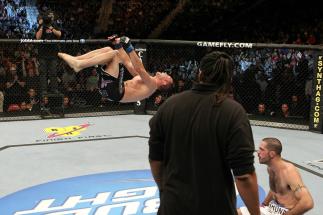 UFC 123: Brian Foster celebrates with a backflip.