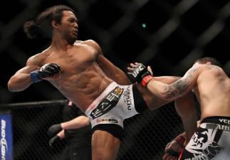 SAITAMA, JAPAN - FEBRUARY 26:  (L-R) Benson Henderson kicks Frankie Edgar during the UFC 144 event at Saitama Super Arena on February 26, 2012 in Saitama, Japan.  (Photo by Josh Hedges/Zuffa LLC/Zuffa LLC via Getty Images) *** Local Caption *** Frankie Ed