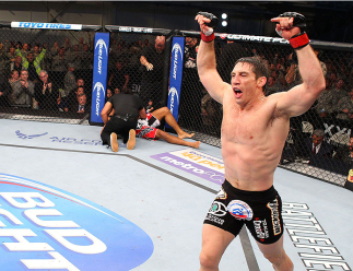 FORT CAMPBELL, KENTUCKY - NOVEMBER 6: Tim Kennedy (right) reacts to his knockout victory over Rafael Natal in their UFC middleweight bout on November 6, 2013 in Fort Campbell, Kentucky. (Photo by Ed Mulholland/Zuffa LLC/Zuffa LLC via Getty Images) *** Lo