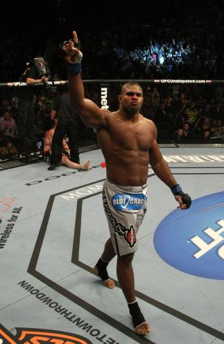 LAS VEGAS, NV - DECEMBER 30: Alistair Overeem celebrates his win over Brock Lesnar during the UFC 141 event at the MGM Grand Garden Arena on December 30, 2011 in Las Vegas, Nevada. (Photo by Donald Miralle/Zuffa LLC/Zuffa LLC via Getty Images) *** Local