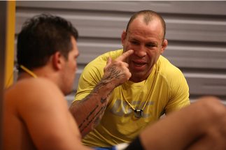 SAO PAULO, BRAZIL - FEBRUARY 8: Coach Wanderlei Silva speaks with Team Wanderlei fighter Jollyson Francino after being defeated by Team Sonnen fighter Marcos Rogerio in their heavyweight fight during season three of The Ultimate Fighter Brazil on Februar